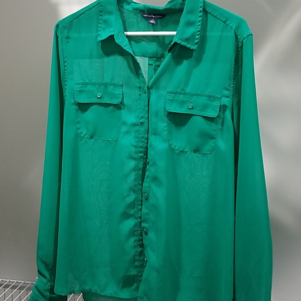 Long sleeve button down semi sheer top